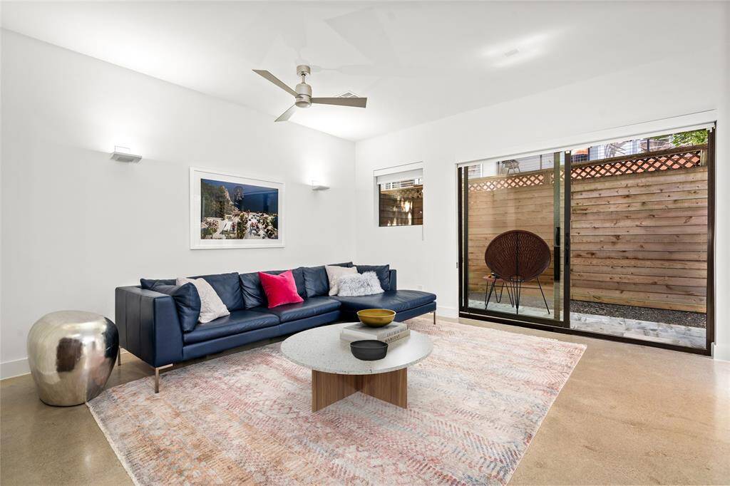 The living area includes a wet bar, and just to the left of the kitchen refrigerator you will find the entrance to the  walk-in pantry. *Virtual staging has been added*