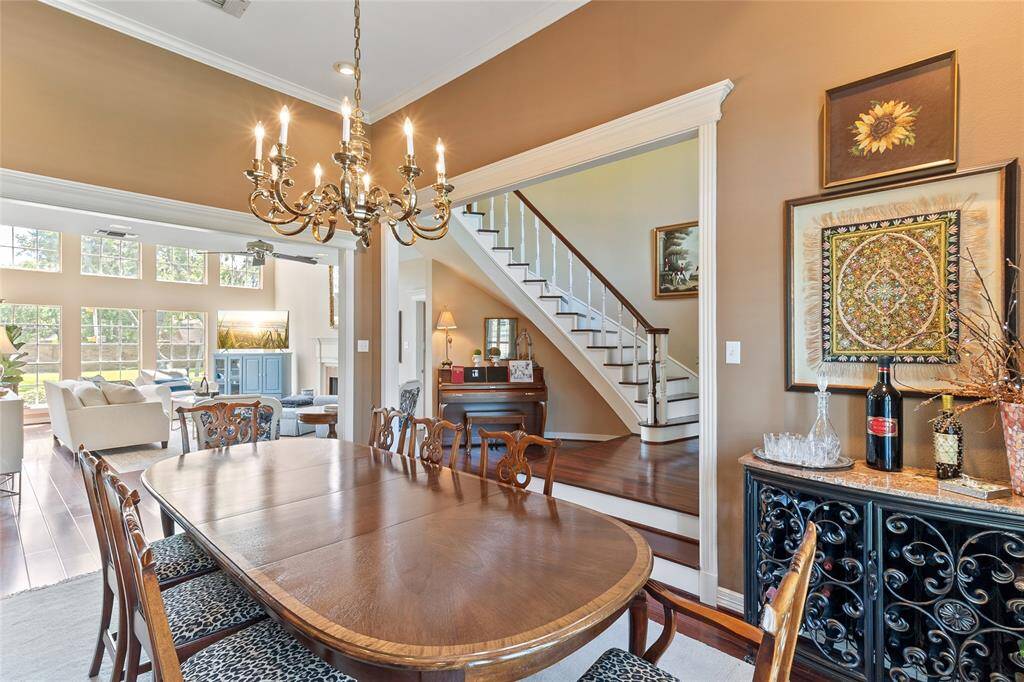 Recently painted in 2024, the formal dining room blends seamlessly into the bright, open living space—creating an ideal layout for hosting guests and enjoying connected everyday living.