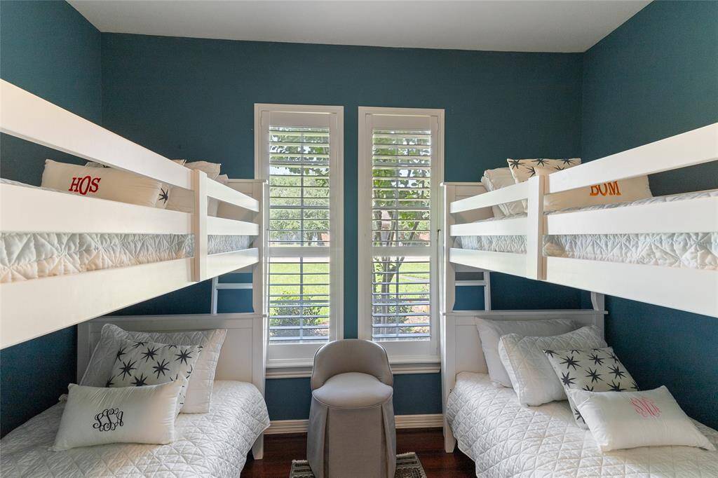 Bedroom #2 is conveniently located downstairs next to the primary suite, making it an ideal space for a home office, nursery, or guest room—offering flexibility to suit your lifestyle needs.