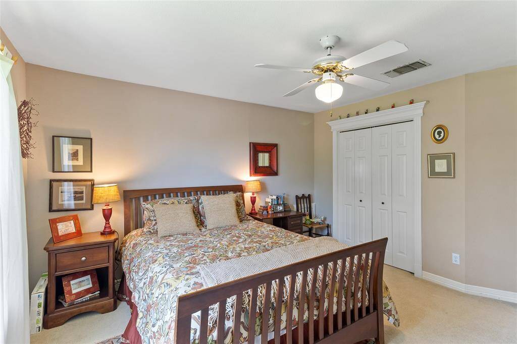 Bedroom #3 (16x16) features dual closets for generous storage & a spacious layout that makes it ideal for a guest room, home office, or comfortable secondary bedroom.