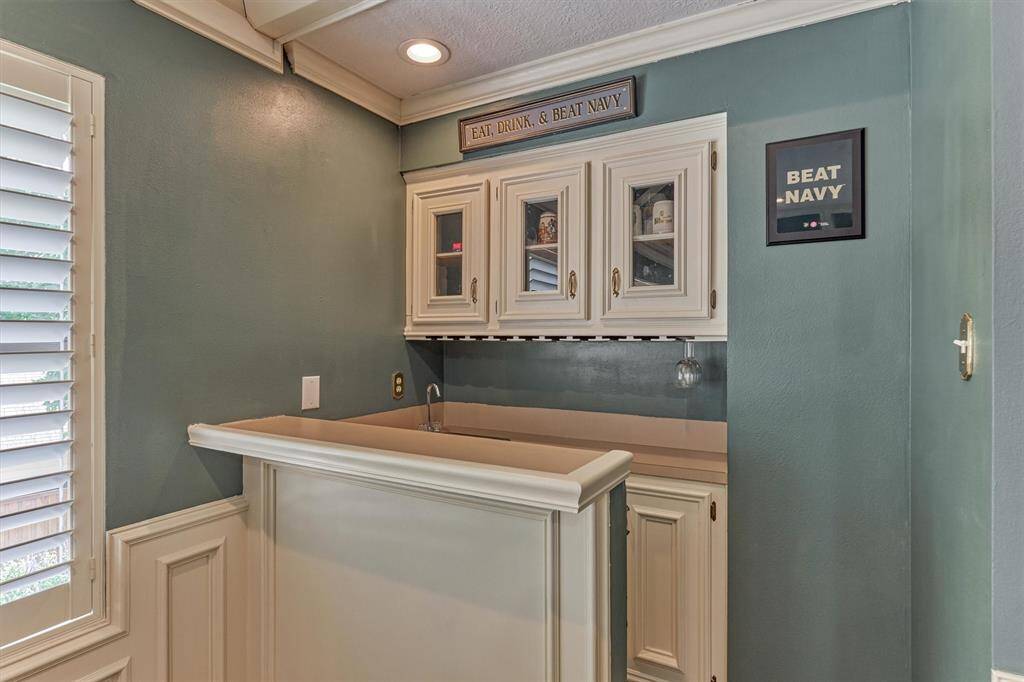Complete with a built-in wet bar—perfect for entertaining guests during movie night or game day.