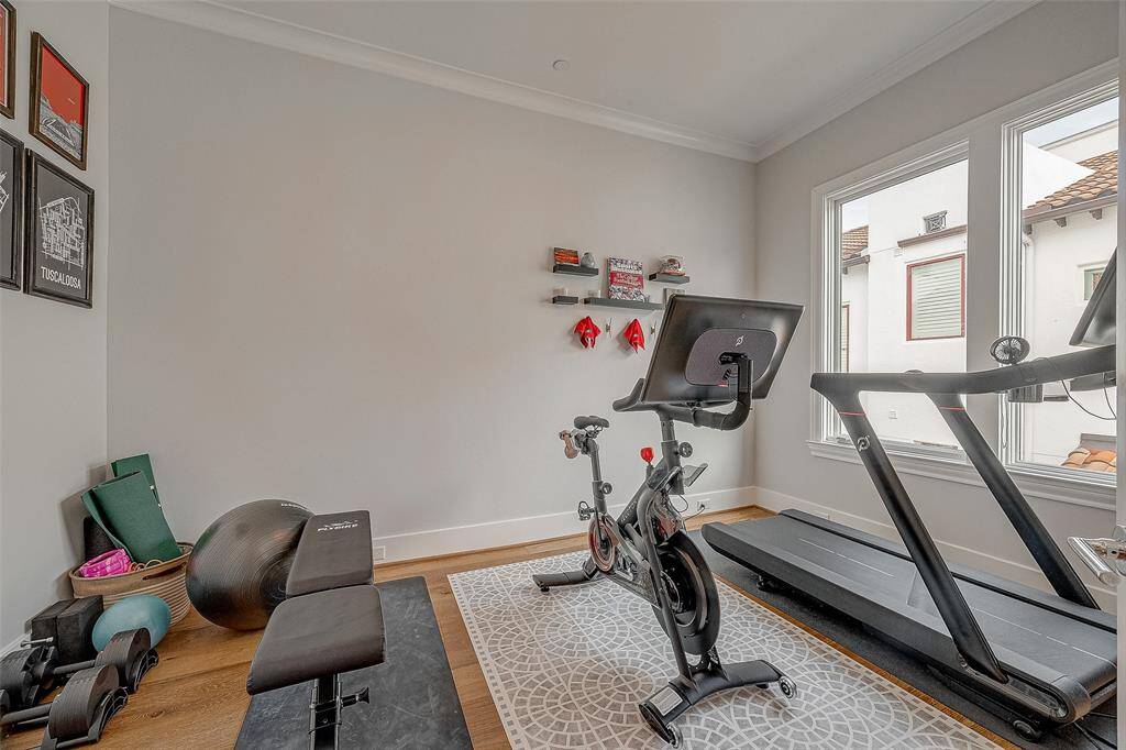 Secondary bedroom, also on the third floor, could be used as a bedroom, home office, gym or flex space. Features an ensuite bathroom.