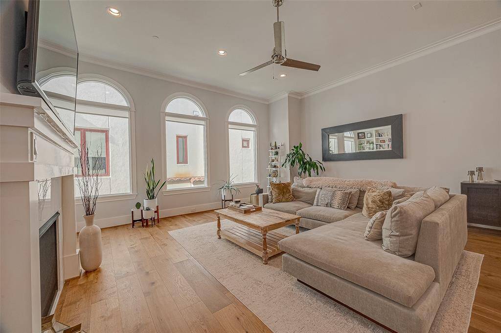 The wall of windows floods the whole second floor with natural light. Hardwoods throughout.