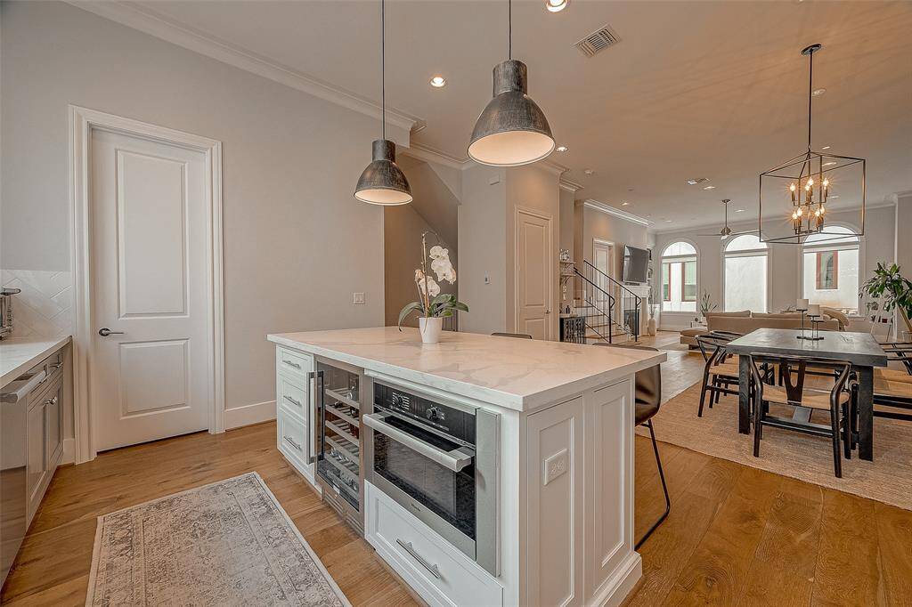 Kitchen also features a wine fridge & walk-in pantry.