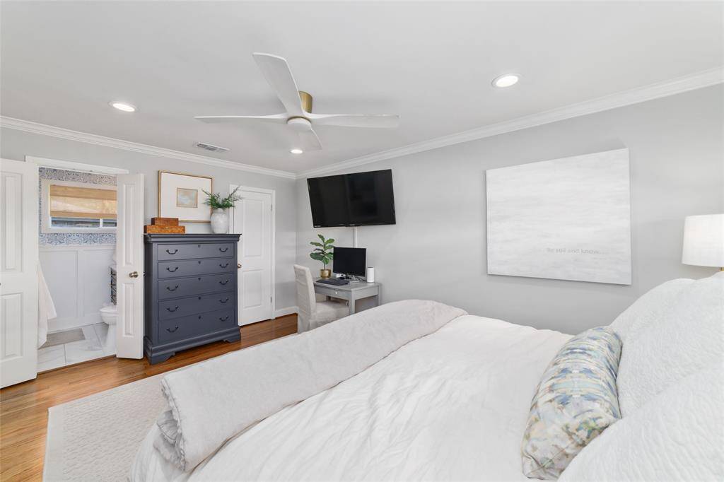 This bedroom is perfect for peaceful mornings or late-night unwinding. The private en-suite bath and spacious walk-in closet add convenience and comfort, making this your ideal end-of-day retreat.