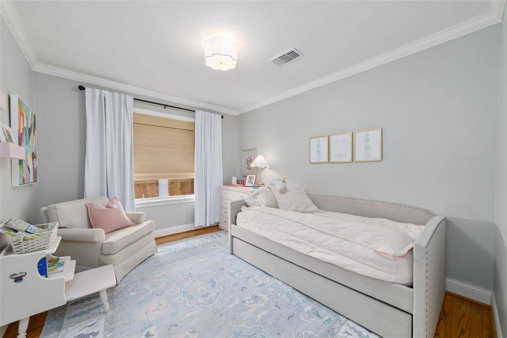 Guests will feel right at home in this quiet, sun-filled bedroom with plenty of room to relax. Or turn it into your dream office, studio, or meditation room, your call.