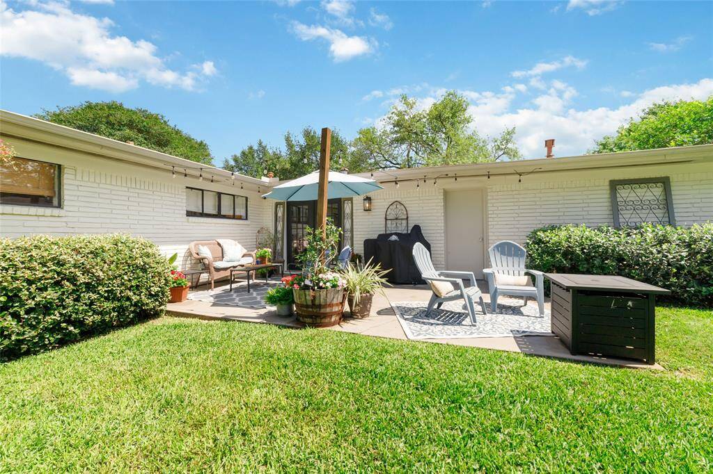 This fully fenced backyard has space to let the dogs run, plant a garden, or finally set up that hammock. It’s a rare combo of space and privacy that’s hard to find.