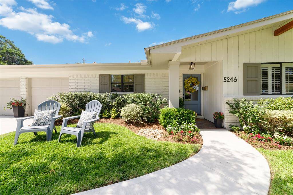 Welcome home to 5246 Creekbend, where cheerful curb appeal, fresh landscaping, and a new driveway create the perfect first impression. The charming front walkway leads to a covered entry with a newly-upgraded front door, setting the tone for the stylish spaces inside.