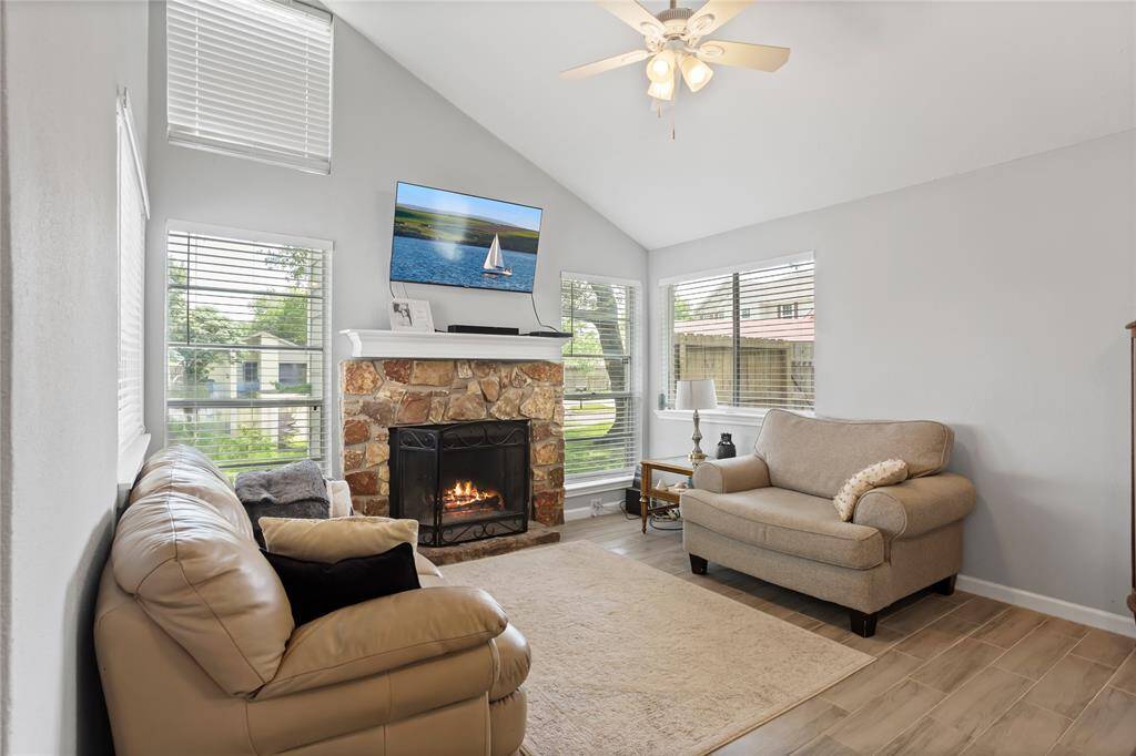 Living Room with high ceilings and fireplace.