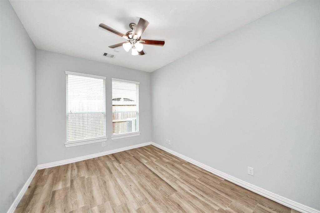 Enclosed study is perfect for the "work at home" executie. This room could easily also be used as an exercise room or additional bedroom.