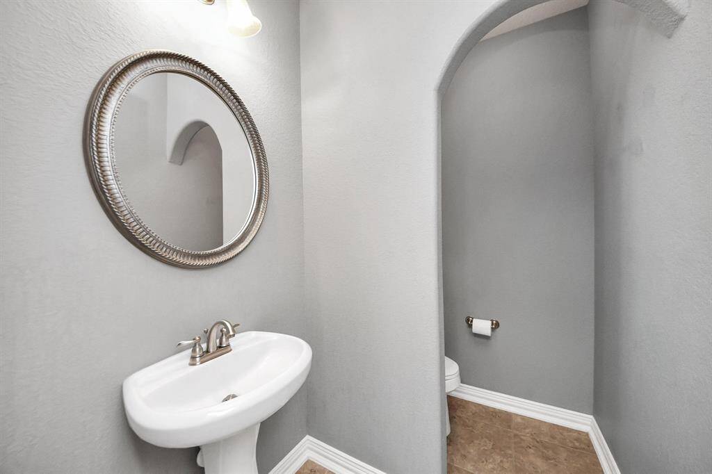 Powder room near the front of the home.