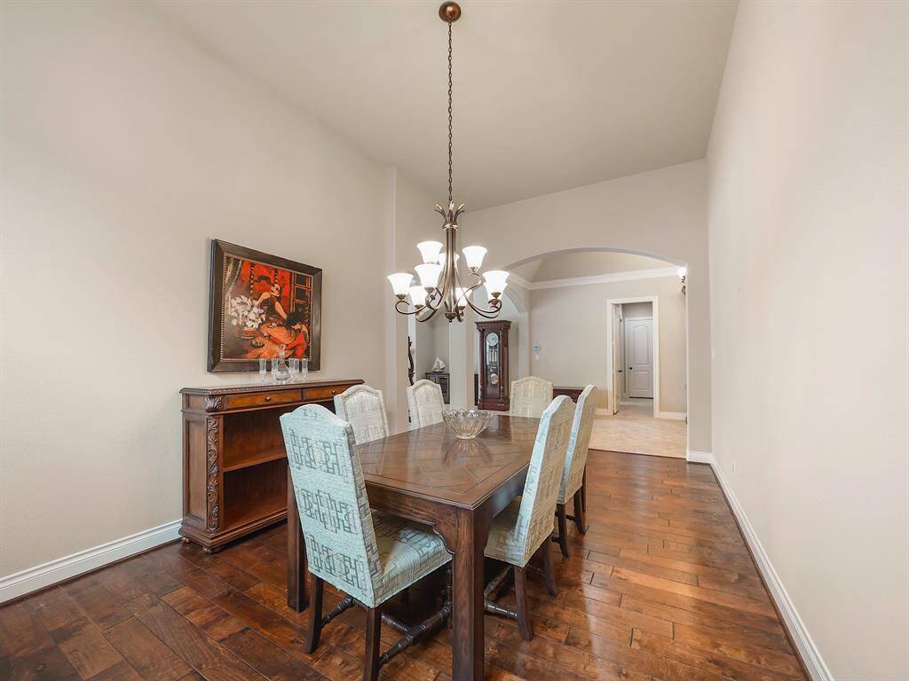 Imagine elegant dinners in the spacious formal dining room, designed to comfortably accommodate a large dining set and create a memorable ambiance.