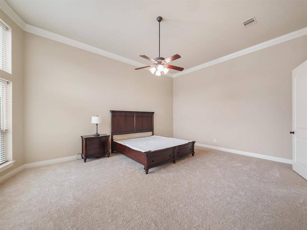 Envision your dream bedroom in this spacious primary retreat. With plenty of room for a king-size bed and all your favorite furnishings, the possibilities are endless for creating a comfortable and stylish personal haven.