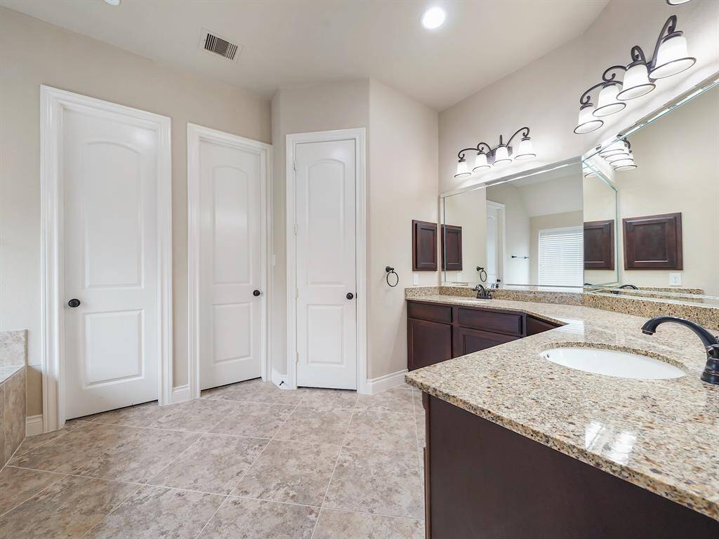 Two walk-in closets can be accessed through the ensuite bathroom!