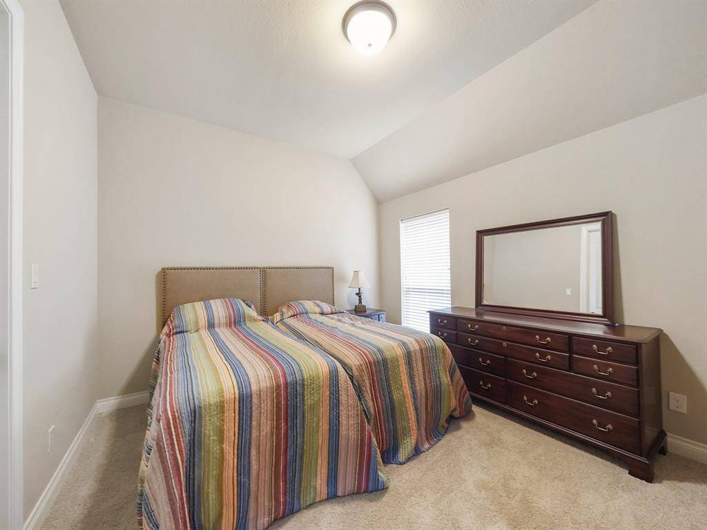 In addition to the primary suite, this home features two generously sized secondary bedrooms, offering ample space for family and/or guests.