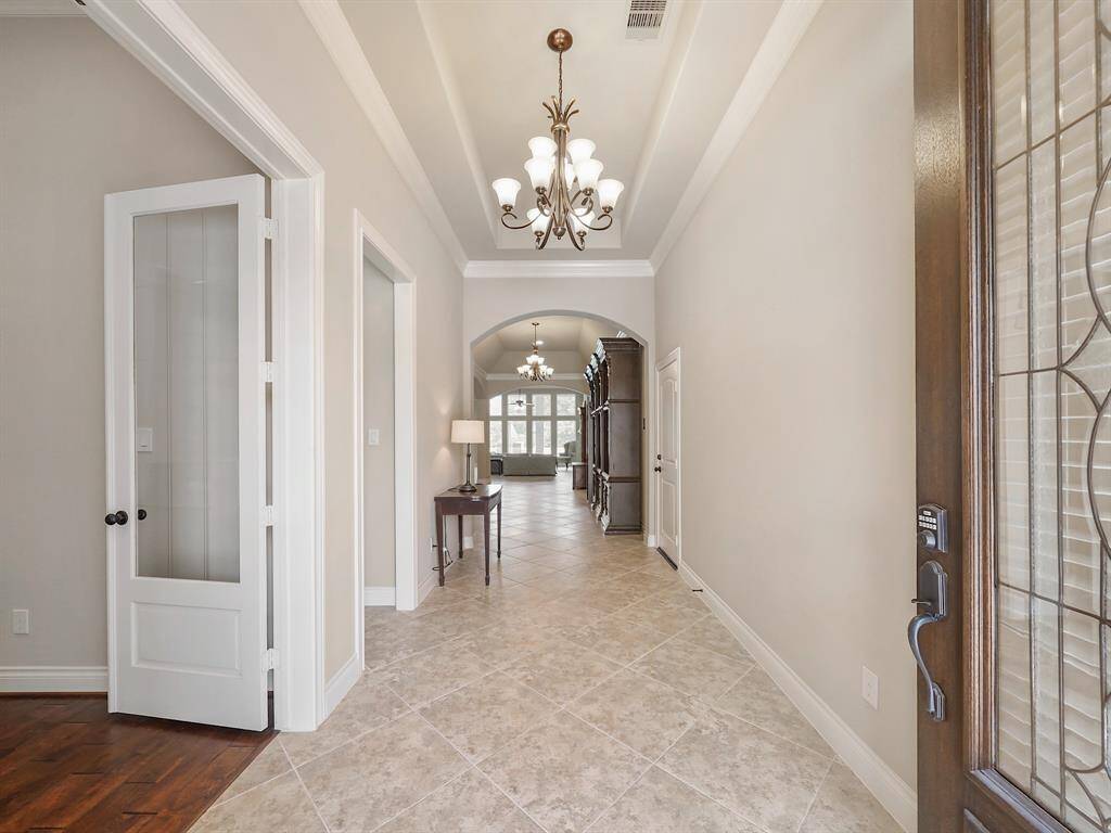 Step inside and be amazed by the soaring ceilings and soft, neutral tones that create a calming atmosphere. This home offers a versatile space for you to make your own, blending comfort and style seamlessly.