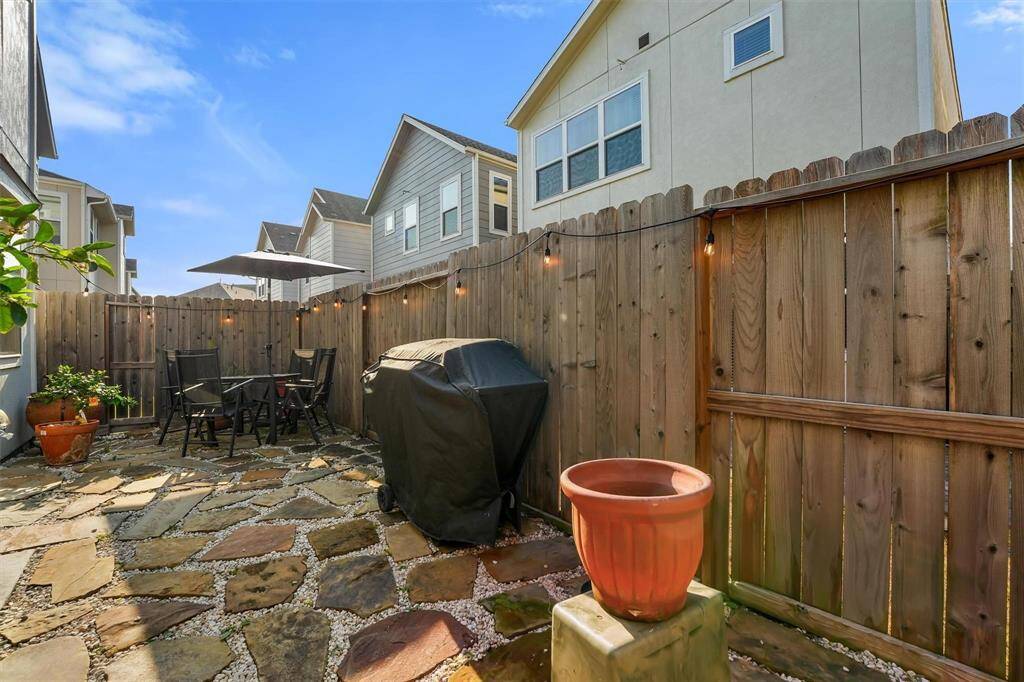Spacious and low maintenance patio area to enjoy the outdoors all year long!