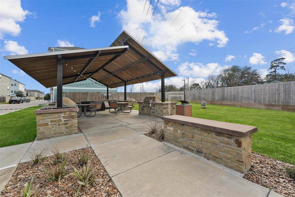 So much great green space and entertaining space really close to this home inside the gated community.