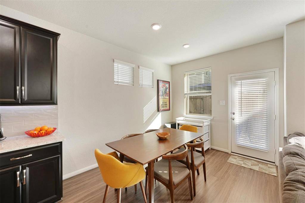 Dining space has great natural light and access to the backyard - plenty of room to entertain or enjoy in this house.