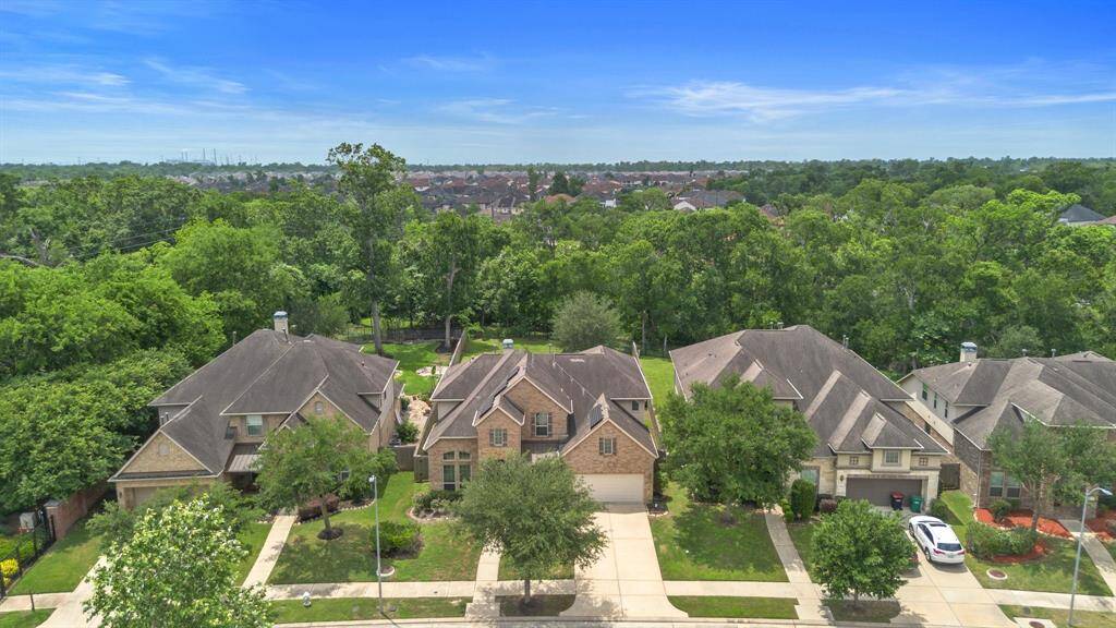 Nestled on a tree-lined street with no back neighbors, this home backs to a greenbelt offering privacy and a peaceful setting.
