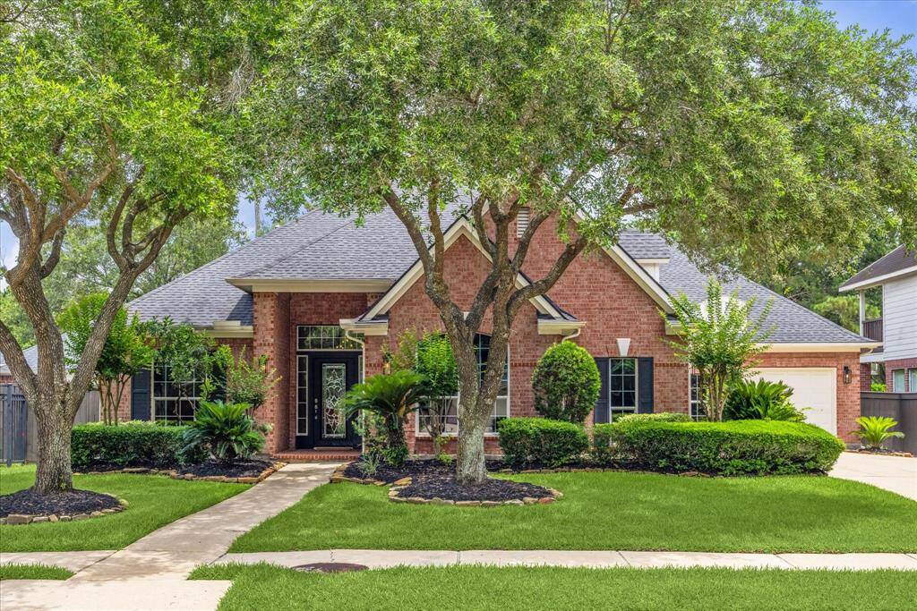 Charming single-story home with a 3-car garage, ideally situated on a premium greenbelt lot in the gated Lakes on Eldridge North community.