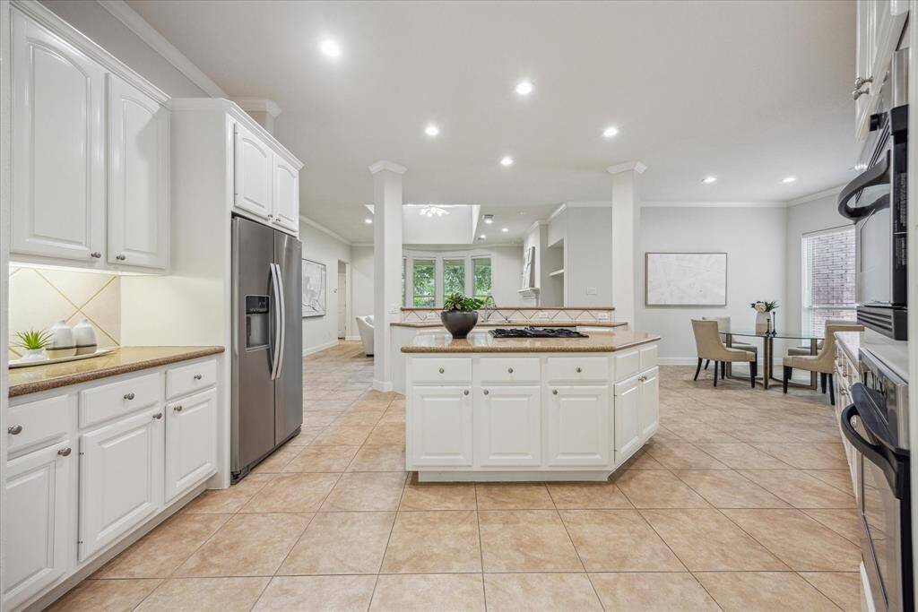 Spacious kitchen offering plenty of counter space and storage, ideal for everyday cooking and entertaining.