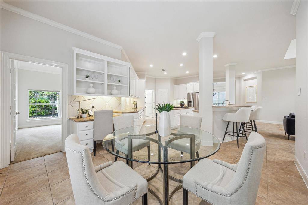 The breakfast room offers seamless flow into the nearby private study. Perfect for working from home or managing daily tasks. In addition to the study, this home features four generously sized bedrooms.