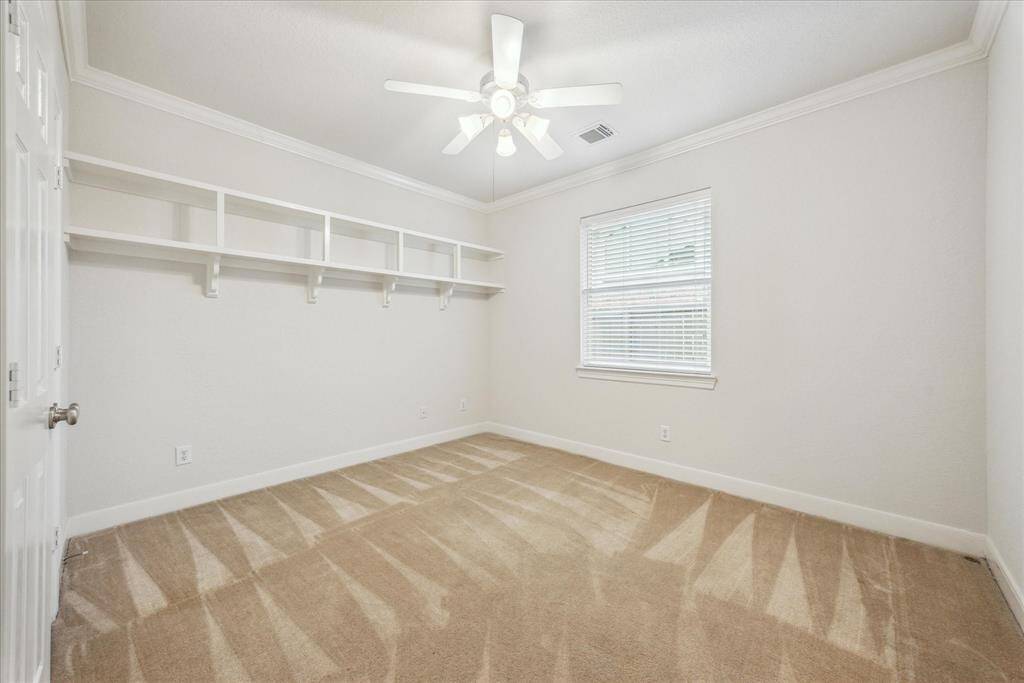 One of three secondary bedrooms.