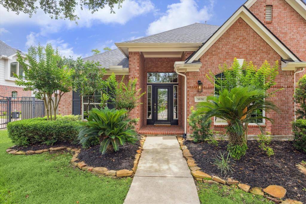 Charming entryway enhance the curb appeal of this well-maintained home in Lakes on Eldridge North.