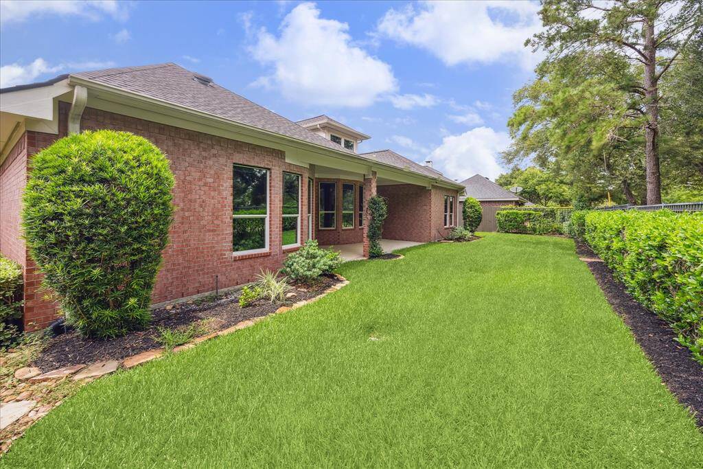 Private backyard with no rear neighbors, backing to a greenbelt for added peace and seclusion.