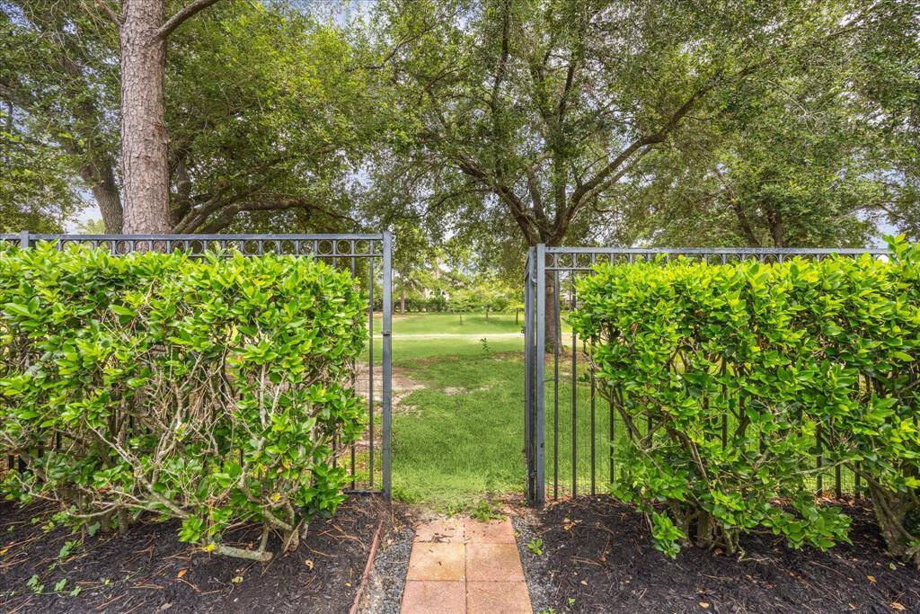 Direct access to the greenbelt from the backyard, with neighborhood walking trails just steps away.