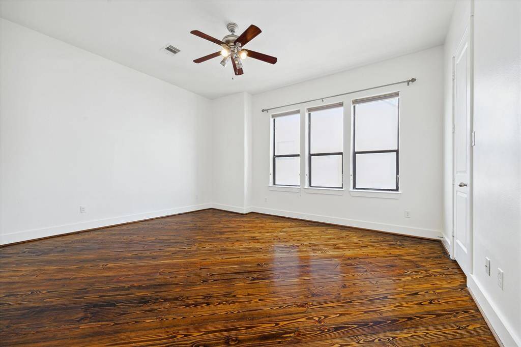 Spacious primary bedroom on third