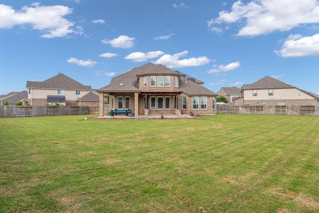 Huge backyard with space for a pool plus more!