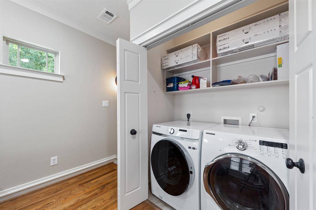 Laundry is at the top of the stairs in the flex space.