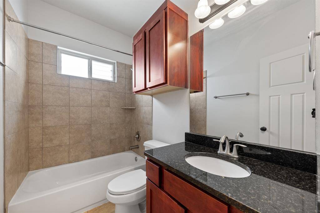 Secondary bathroom upstairs between bedroom and flex room.