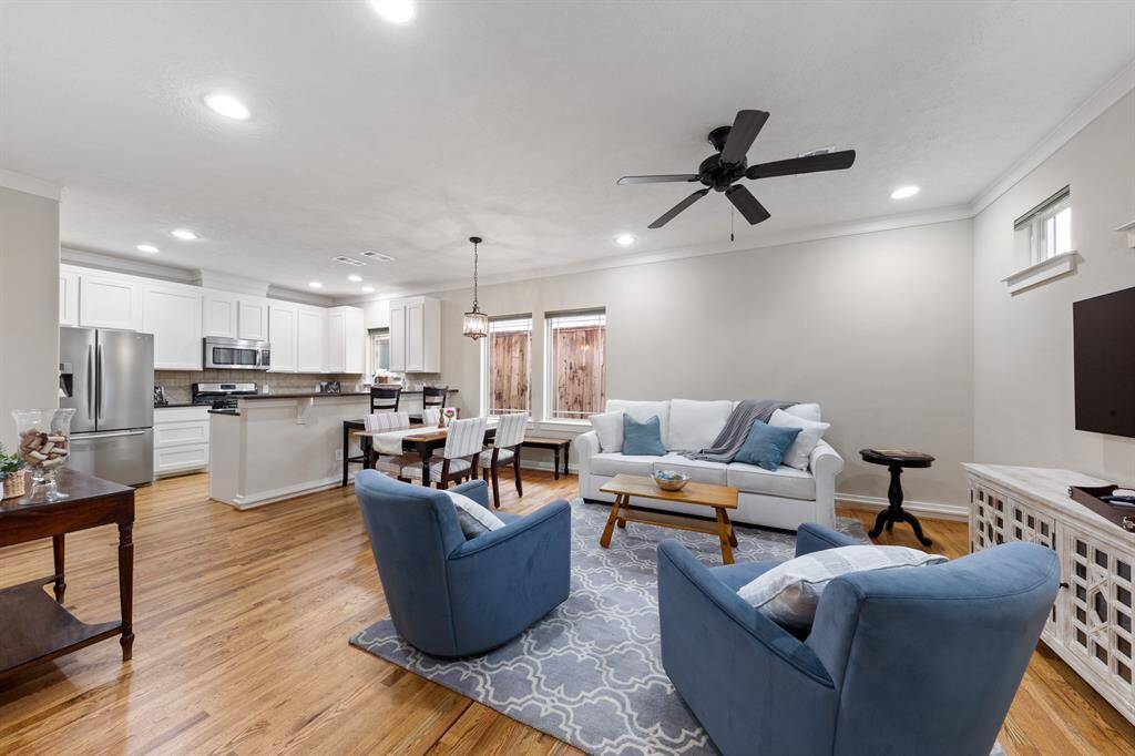 Open living/dining/kitchen concept.