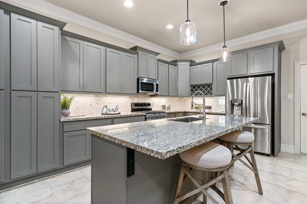 Fabulous kitchen with huge island with seating. All remodeled in 2021.