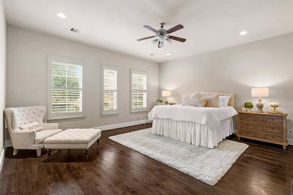 Primary suite is oversized and has hardwood floors and ensuite bathroom.
