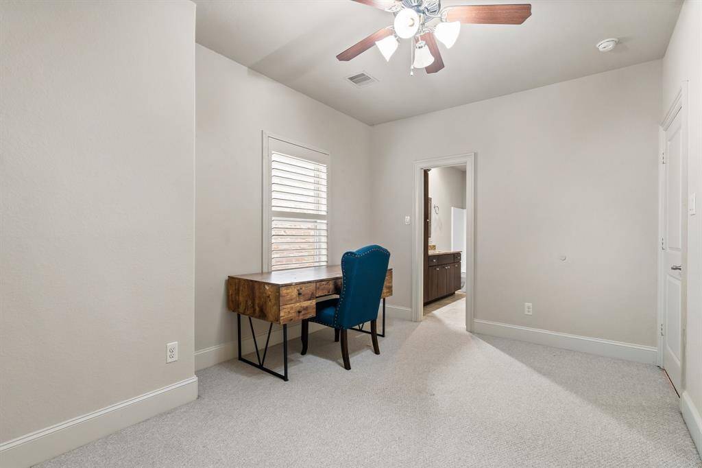This is the 2nd secondary bedroom upstairs. All windows have plantation shutters.