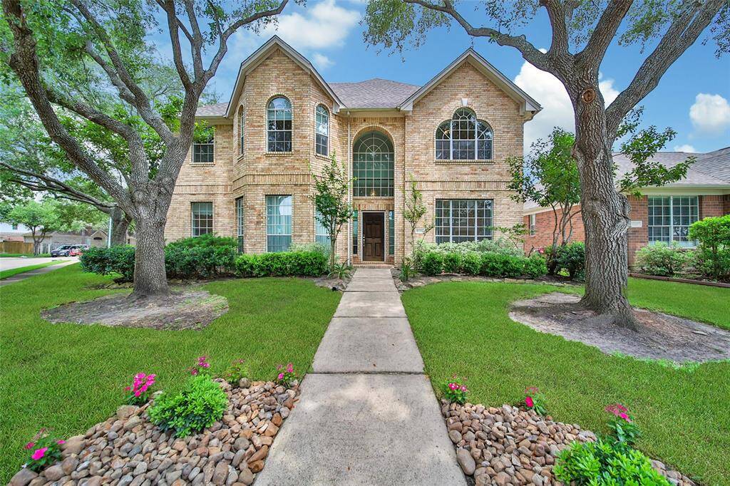 Welcome home to 6215 Jacob Canyon, a stunning two story open concept home located in the heart of Canyon Gate at Cinco Ranch, a resort style gated community in Katy.