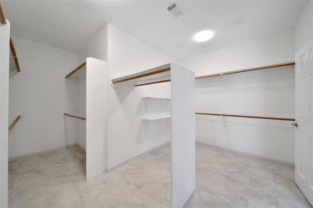 This thoughtfully designed closet is sure to impress and must be seen in person to truly appreciate.