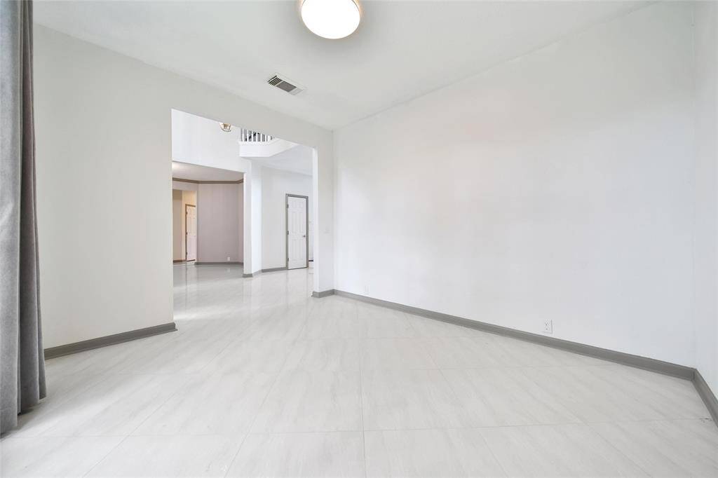 This is a flexible space for a home office, sitting room, craft room, gym, or whatever your personal needs command.