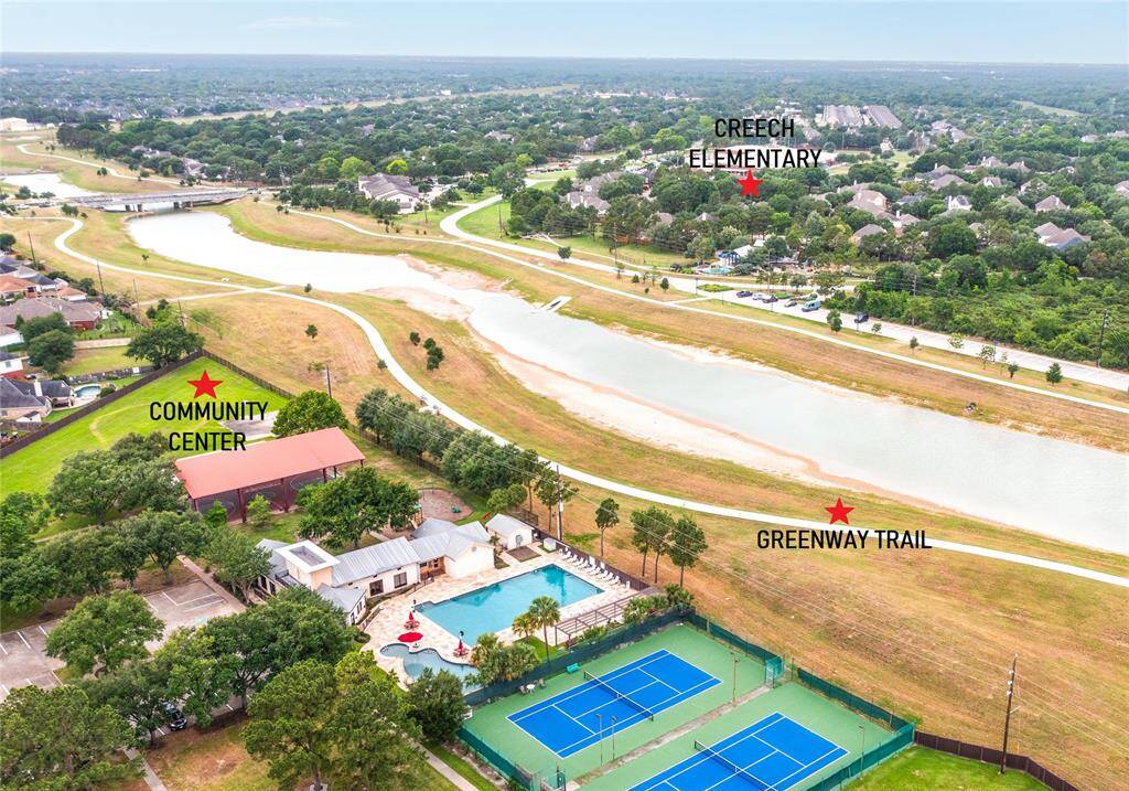Canyon Gate at Cinco Ranch is a manned-gated resort style community located in a prime location in Katy with easy access to schools, trails, shopping and main commuting thoroughfares. This photo shows the community center, greenway trail and how close the community is to Creech Elementary.