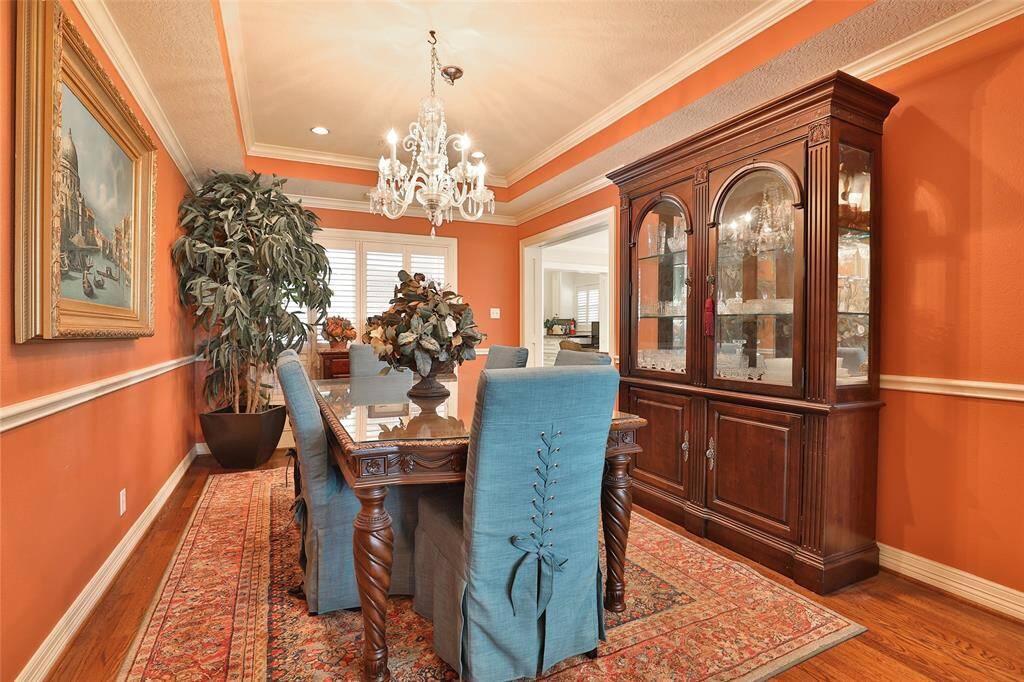 Your guest will love sharing a meal in this beautiful dining room!  Crystal chandilier is excluded from the sale of the house.