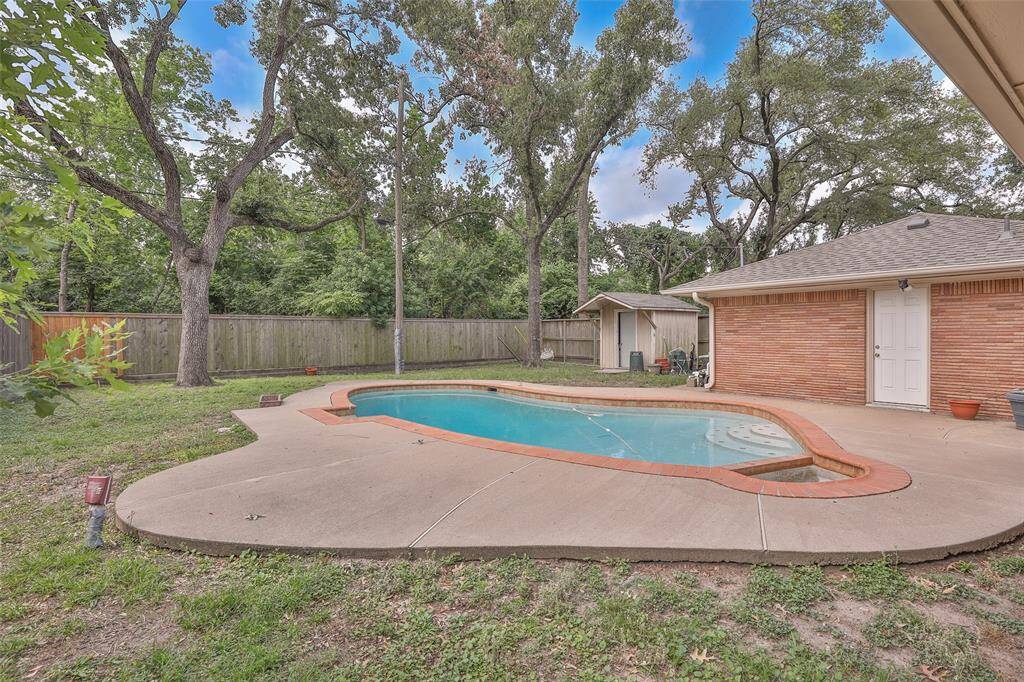 Still plenty of grassy area to add tables or chairs or swingsets!  Nice storage building!