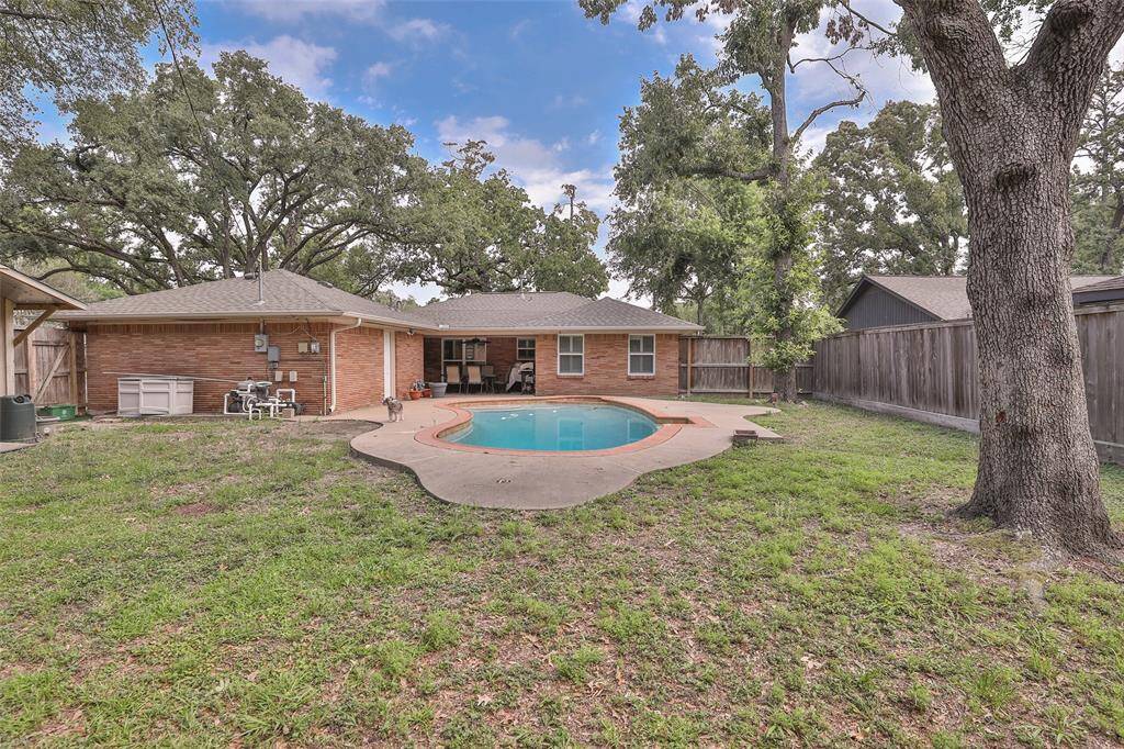 Being on a corner lot, you have plenty of room for expansion!  Wood fencing all around.