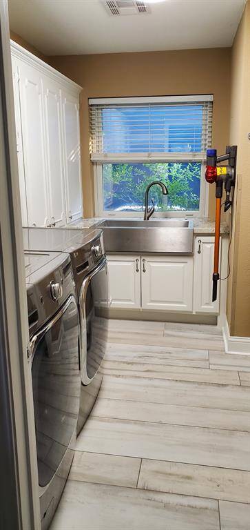 Utility room with stainless steel sink