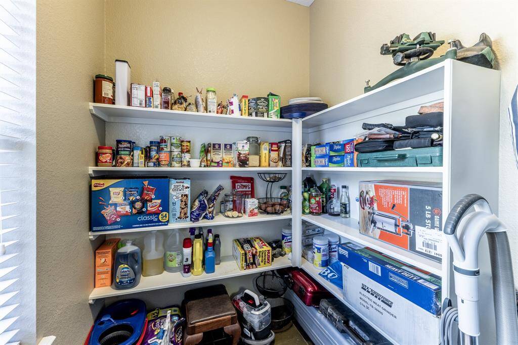 Texas-sized and ready for it all—this walk-in pantry has the space for your Costco hauls, secret snacks, and everything in between. Storage goals? Achieved.