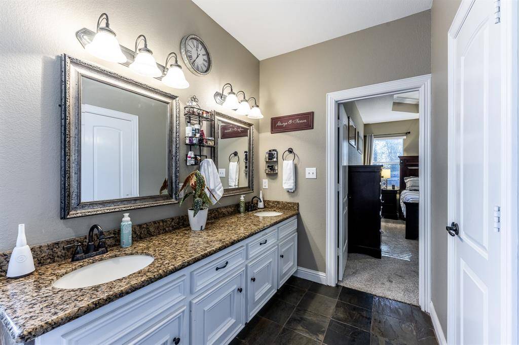 Plenty of counter space, loads of storage, and a layout that just makes sense—this bathroom is all about getting ready without the chaos.
