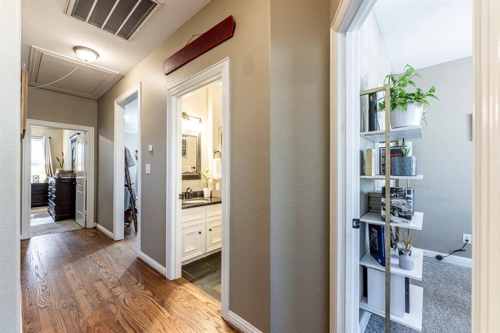 A peek down the hall shows smart flow and easy access to guest rooms, bathrooms, and extra space—because thoughtful layout makes all the difference.